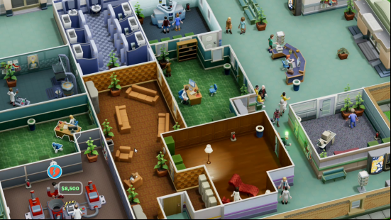 Best management games: a well run hospital in Two Point Hospital, complete with staff rooms, treatment areas, and GP offices.