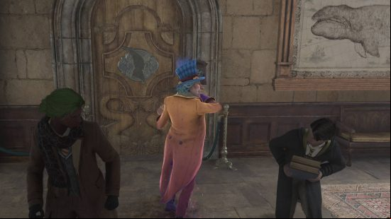 Hogwarts Legacy characters - Peeves is bullying a child in a corridor.
