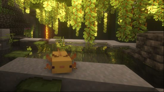 a yellow Minecraft axolotl in a lush cave