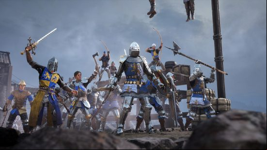 Best Medieval games - a band of knights standing on a hill with their weapons raised in Chivalry 2.
