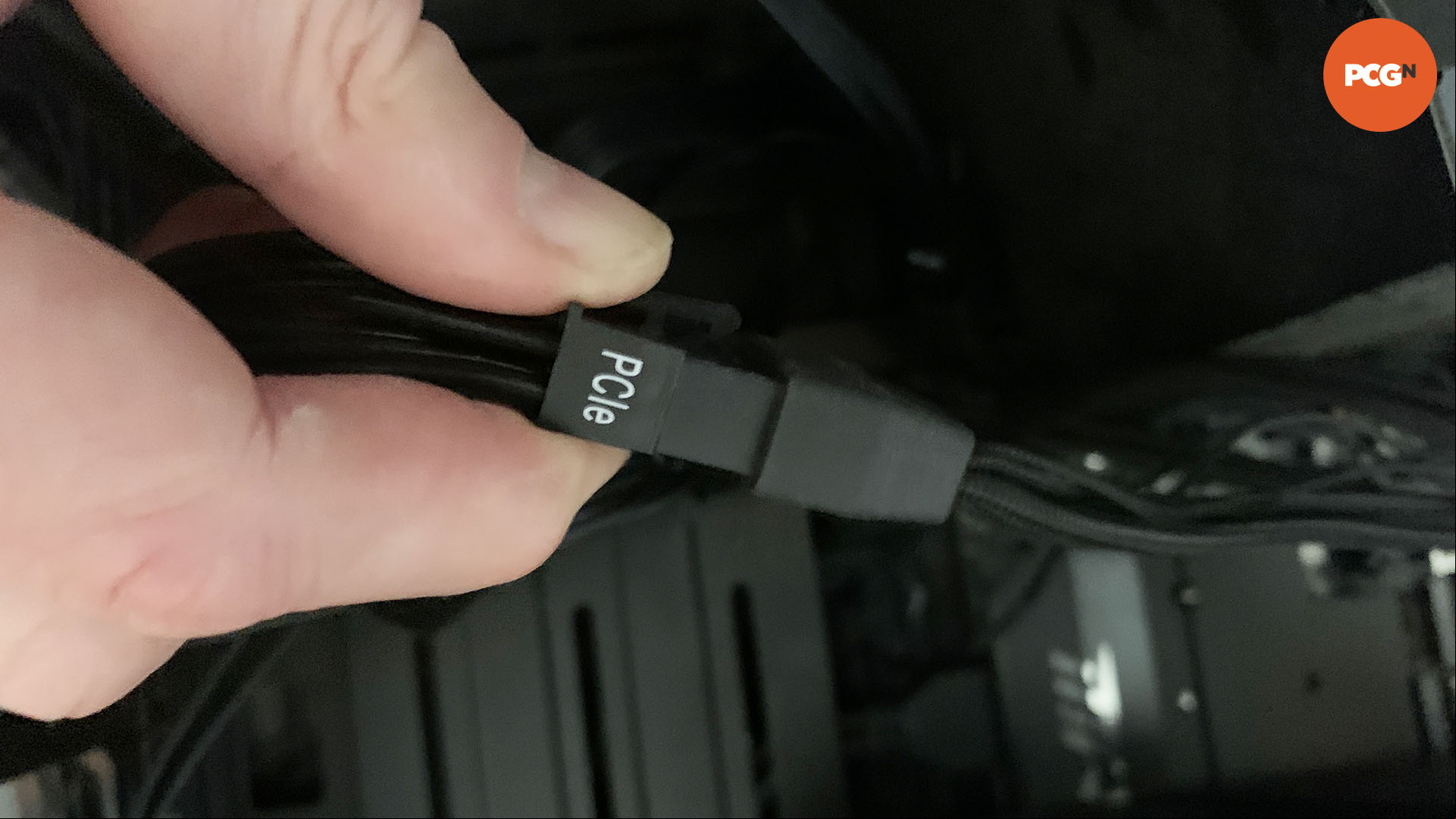 How to install a graphics card: Connect eight-pin cables to your 12VHPWR adapter.