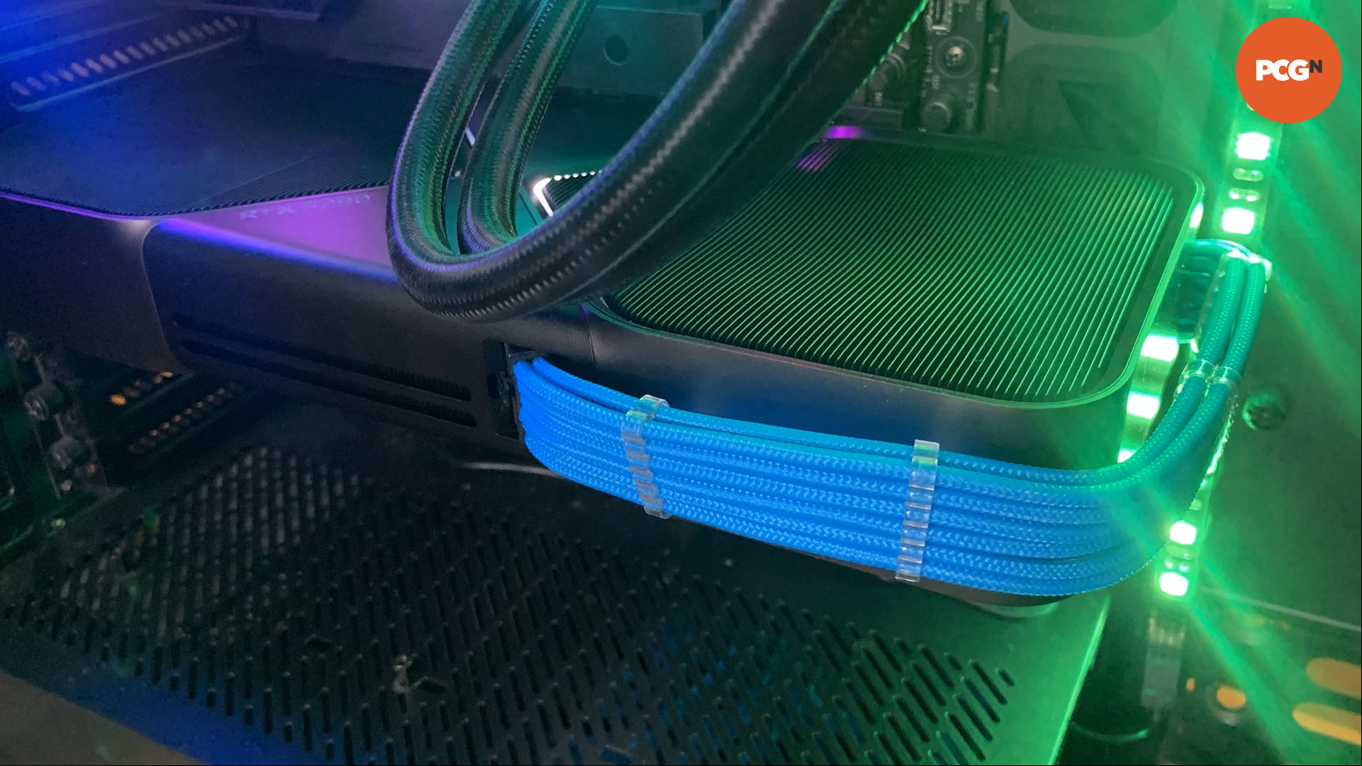 How to install a graphics card: Nvidia GeForce RTX 5090 with blue CableMod extension lead fitted.