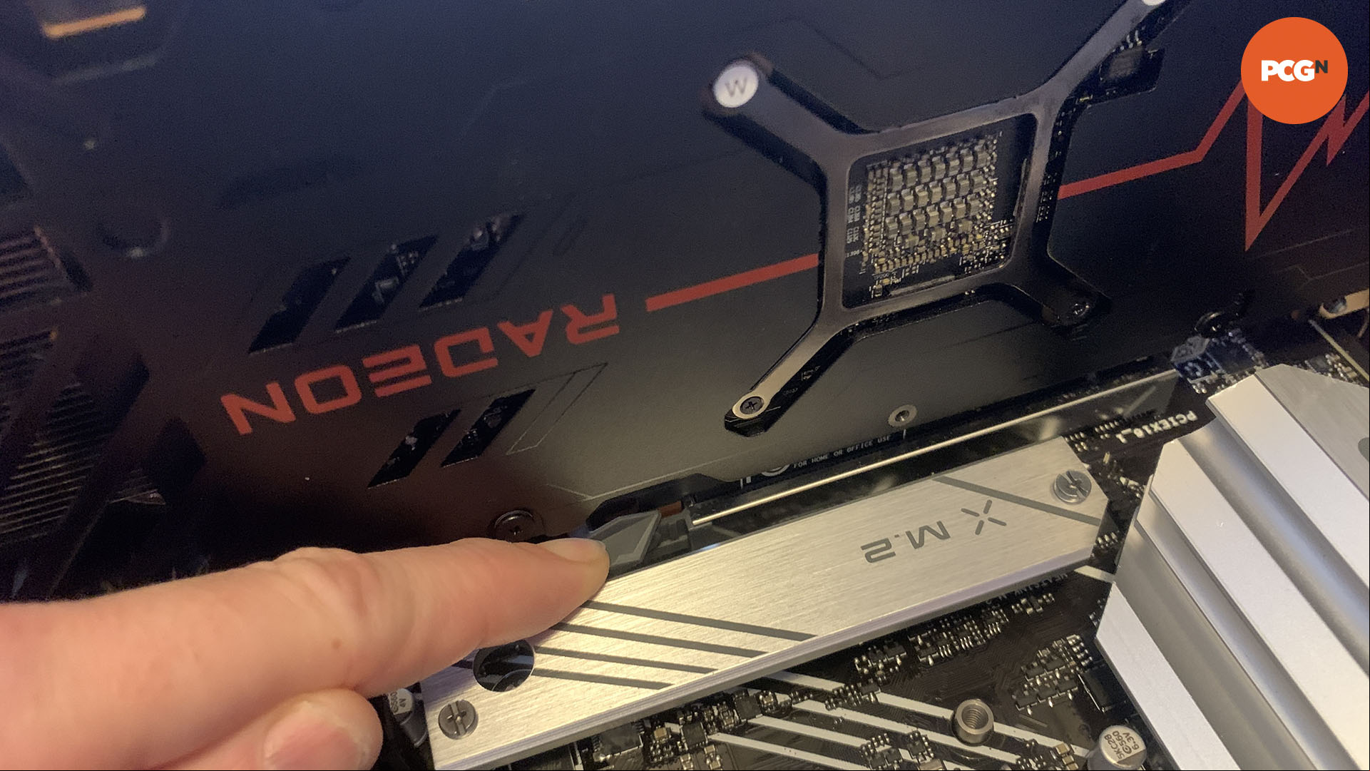 How to install a graphics card: Press PCIe slot latch on old motherboard.