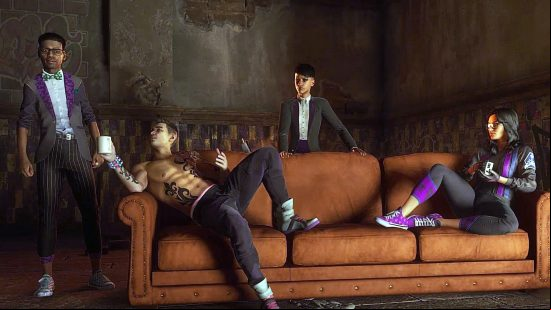 The Saints lounge across a couch, chatting