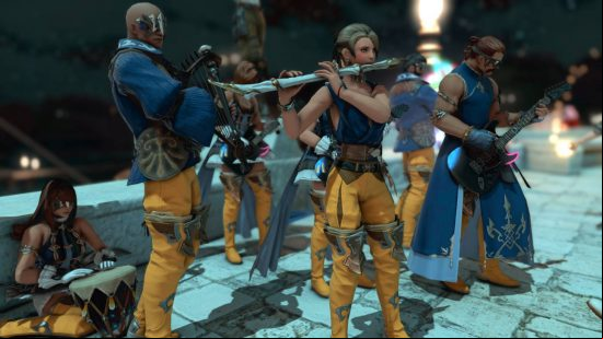 A man wearing bright yellow tros and a black vest top plays a large flute alongside a band