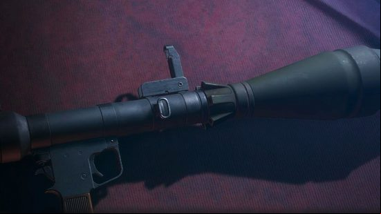 Resident Evil 4 best weapons: The Rocket Launcher lying on the counter of the Merchant's shop stall.