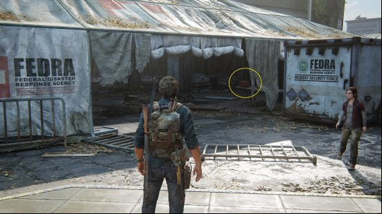 The Last of US workbench tool locations: a man looks at a broken down and ripped white tent.
