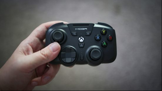 The Moga XP Ultra PC controller being held in the hand