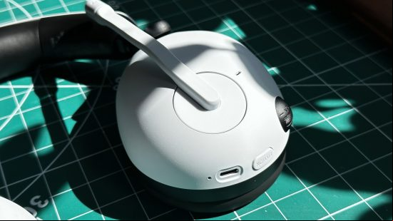 Sony Inzone H9 gaming headset o a desk in the sun
