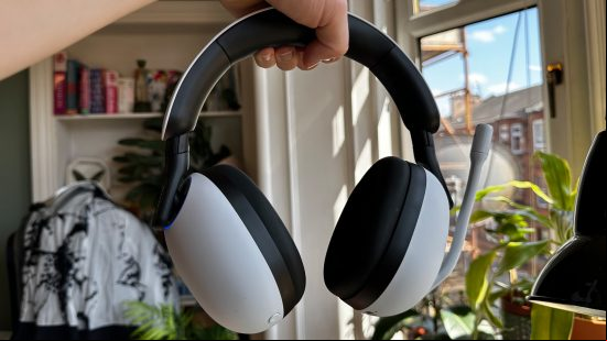 Sony Inzone H9 gaming headset being held up to show the design