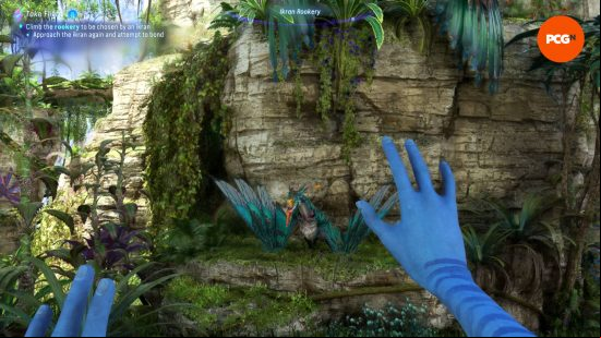 A Na'vi is approaching an Ikran to try and tame it during our Avatar Frontiers of Pandora preview.
