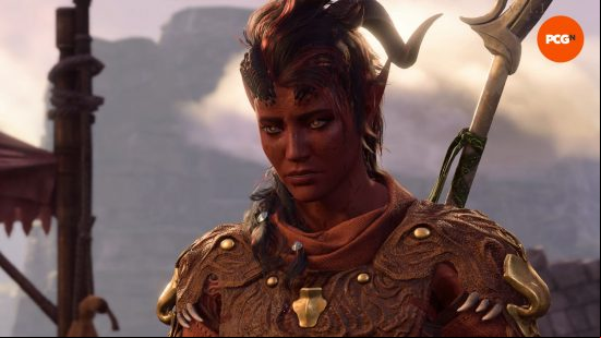 BG3 romance: a heavily armored nored woman looks sad.
