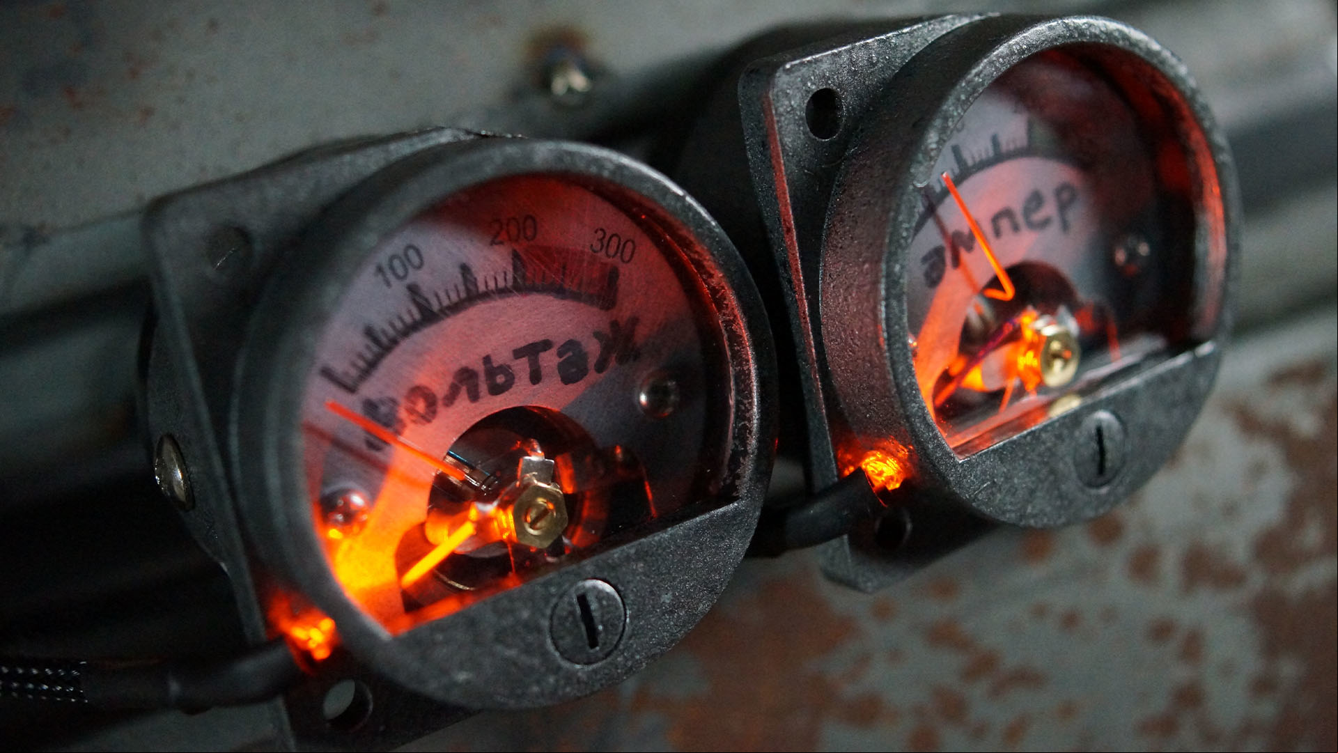 Two dials with Russian writing on the front of a Metro Exodus gaming PC