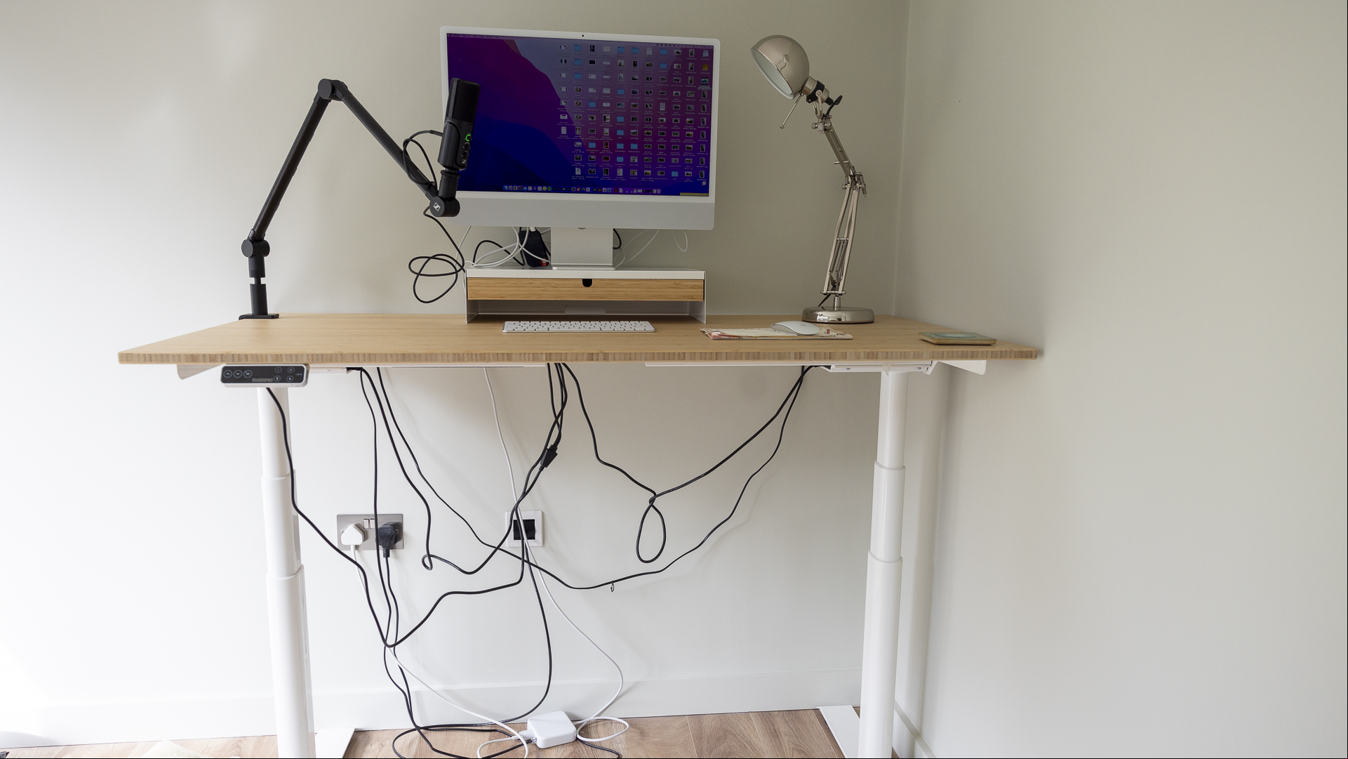 Flexispot E8 Standing Desk review image showing the desk fully erect.