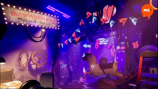 The garage in Reveil, lit in neon colors with glowing painted icons around the room.