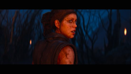 Hellblade 2 preview: Senua turns to look behind her, fearful as a thicket of branches closes in claustrophobically around her.