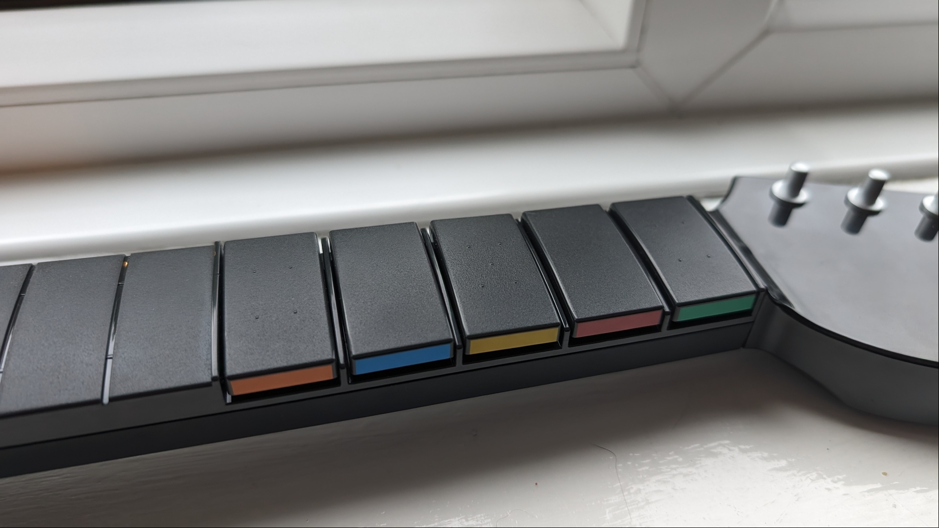 PDP Riffmaster Guitar controller review image showing a close up of the frets.