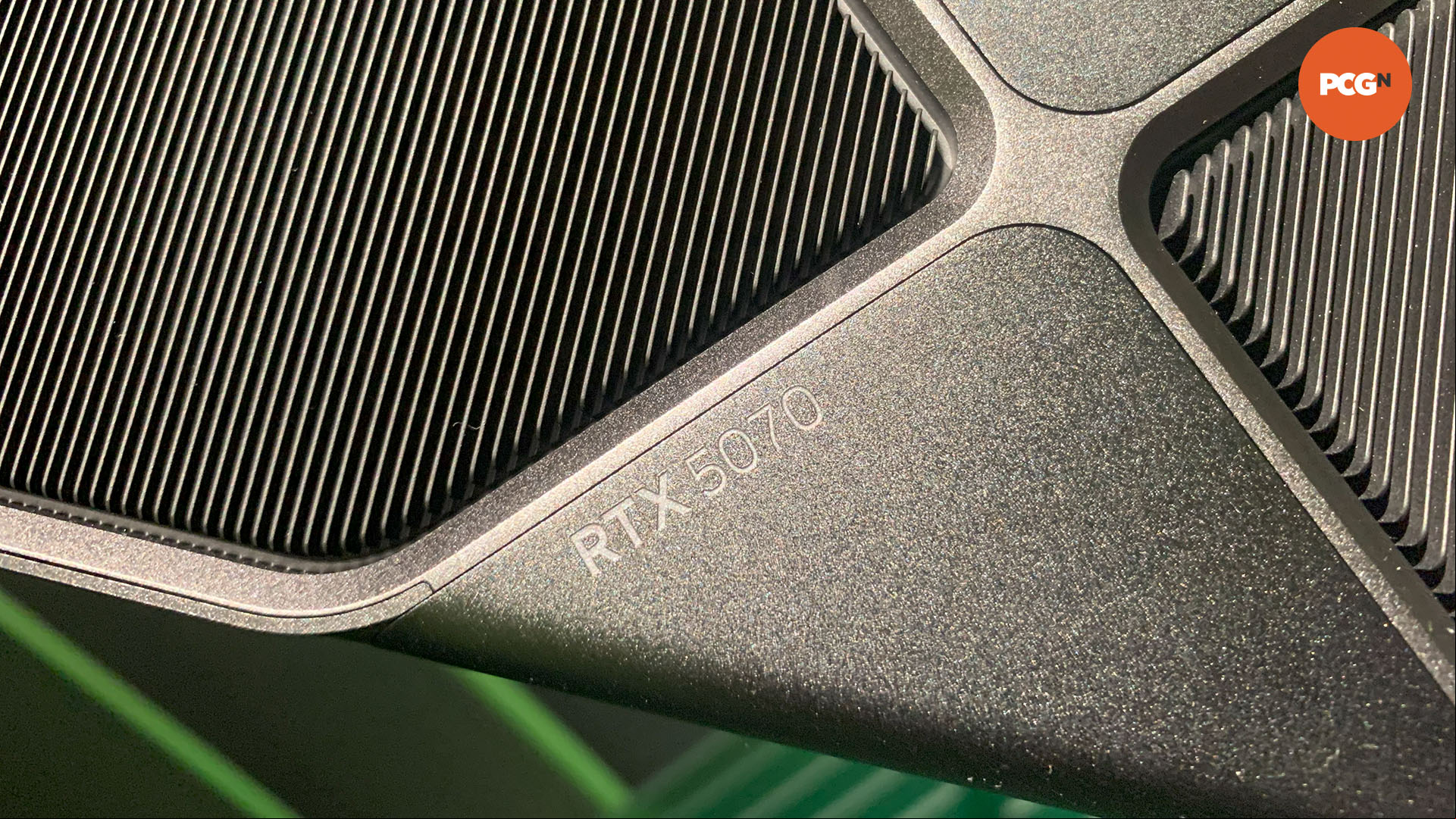 Nvidia GeForce RTX 5070 guide: Closeup of text on cooler, taken from CES 2025.