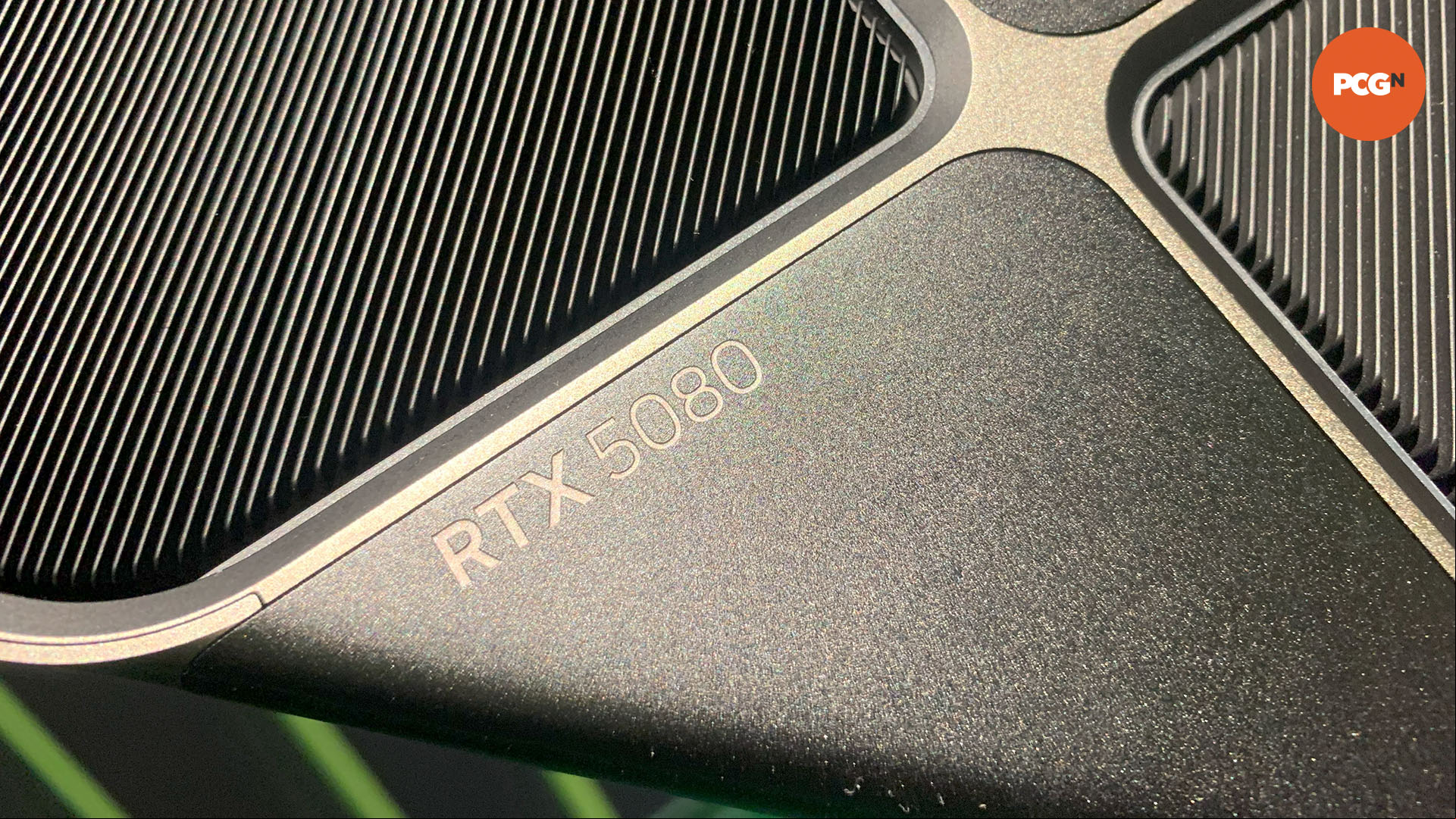 Nvidia GeForce RTX 5080 guide: Closeup text on graphics card, taken from CES 2025