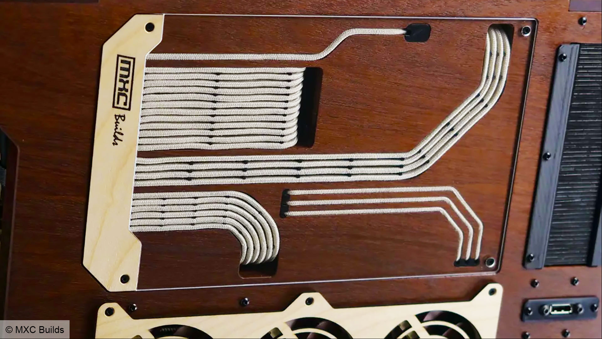 Noctua gaming PC build cable management closeup by MXC Builds.