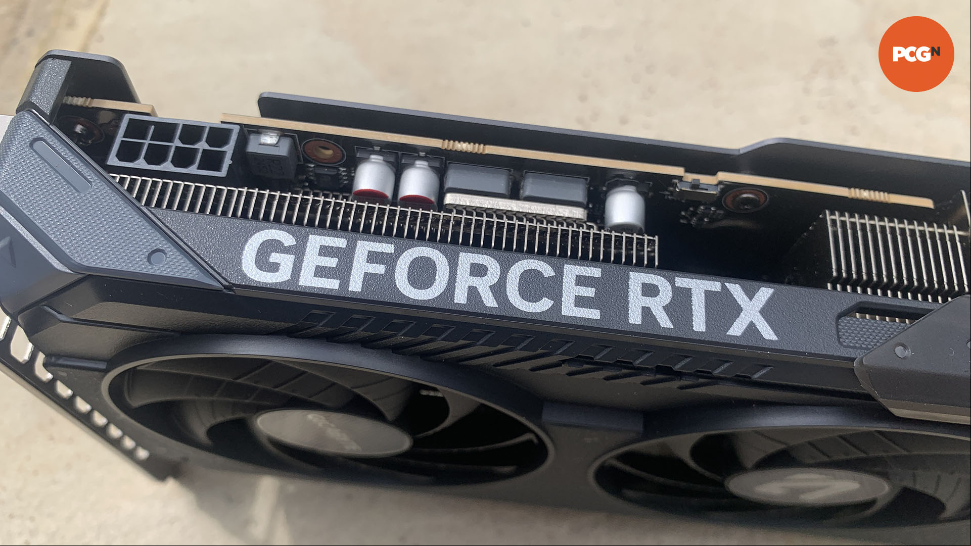 Nvidia GeForce RTX 5060 review: Gigabyte Gaming OC graphics card 8-pin power connector closeup.